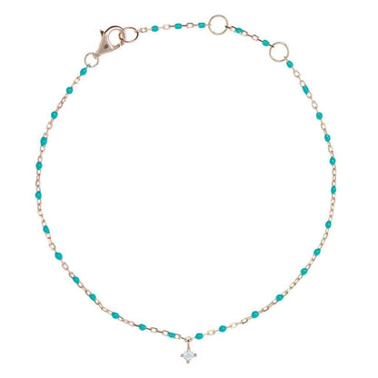 Turquoise bead and rose gold chain bracelet with hanging CZ.