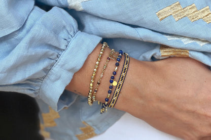 Wisdom Blue Five Charm Stretch Gold Bracelet