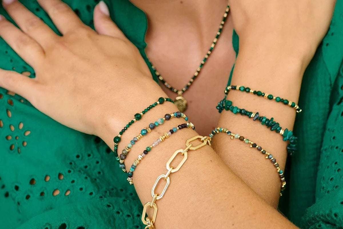 Sana Malachite Gold Charm Crystal Bracelet worn with more malachite and gold bracelets in the collection 