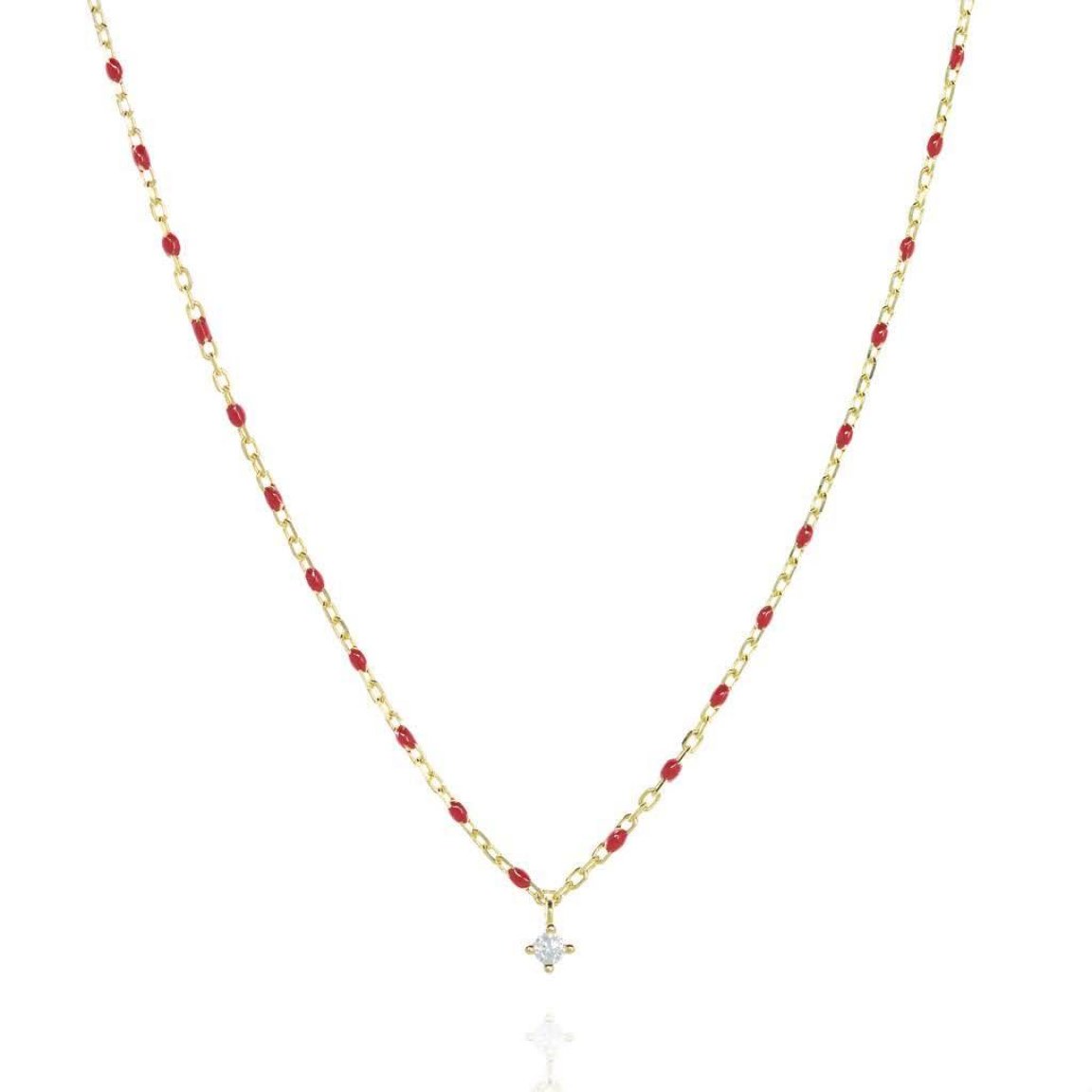 Short Gold chain and bead necklace. Red bead, small cubic zirconia at a central point on the necklace.